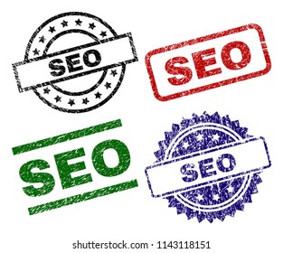 SEO seal prints with distress texture. Black, green,red,blue vector rubber prints of SEO title with grunge texture. Rubber seals with round, rectangle, medallion shapes.