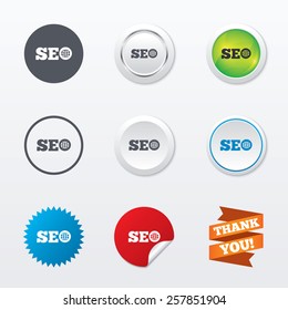 SEO sign icon. Search Engine Optimization symbol. Circle concept buttons. Metal edging. Star and label sticker. Vector