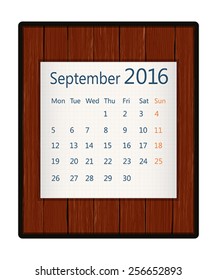 September 2016 paper calendar on wood