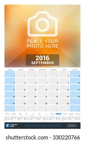 September 2016. Wall Monthly Calendar for 2016 Year. Vector Design Print Template with Place for Photo and Year Calendar. Week Starts Sunday