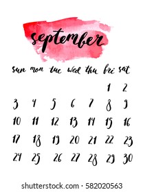 September 2017 calendar with ink calligraphy elements and watercolor light red background. Week starts Sunday.