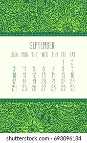 September 2017 vector calendar over green lacy doodle hand drawn background, week starting from Sunday.