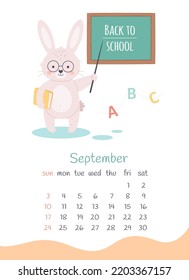 September 2023 calendar. Cute bunny teacher standing near school board. The year of the Rabbit, bunny symbol of 2023. Week starts on Sunday. Vector illustration