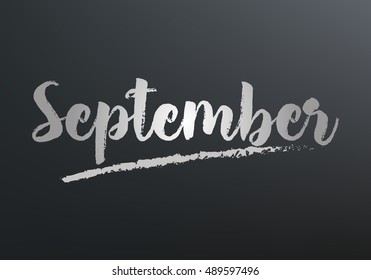 September month text written on the blackboard with chalk board effect vector graphic illustration