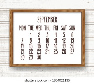 September year 2020 vector monthly calendar. Hand drawn text in a wooden frame over rustic distressed light brown and white wood background. Week starting from Monday.