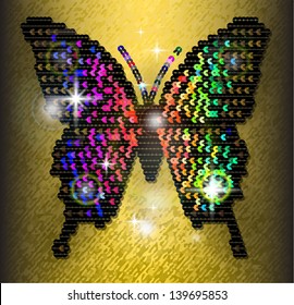 Sequin butterfly on the golden background