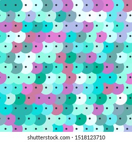 Sequins background. Glitter fabric texture. Colorful sequins background.