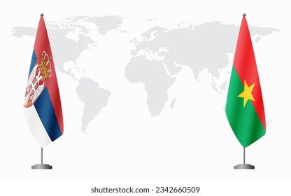 Serbia and Burkina Faso flags for official meeting against background of world map.