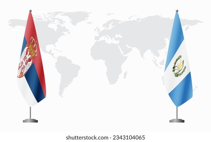 Serbia and Guatemala flags for official meeting against background of world map.