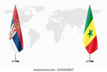 Serbia and Senegal flags for official meeting against background of world map.