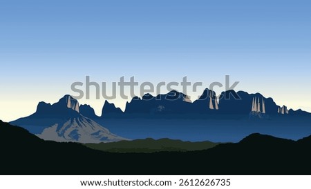 A serene and breathtaking view of the Big Bend National Park at dusk, with the rugged mountain silhouettes against a glowing, twilight sky.