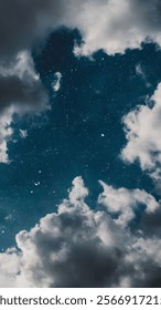 A serene nighttime sky with a dense scattering of stars peeking through gaps in dramatic, fluffy clouds. The dark teal-blue atmosphere adds a calming yet mysterious vibe to the scene, blending the cel