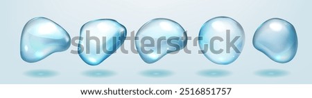 A series of realistic blue spheres are floating in the air. The spheres are all different sizes and are scattered throughout the image