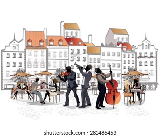 Series of street cafes with musicians in the old city