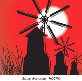 series of windmills under the sun	