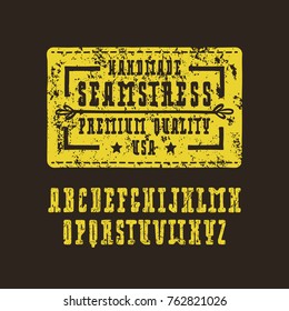 Serif font with rounded corners in the style of handmade graphics. Denim label and letters with rough texture for t-shirt design. Yellow print on black background