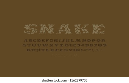 Serif font in the style of handmade graphics. Typeface with cracked face and vintage texture. Print on brown background