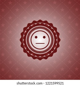 serious face icon inside badge with red background