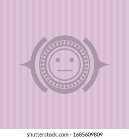 serious face icon inside badge with pink background