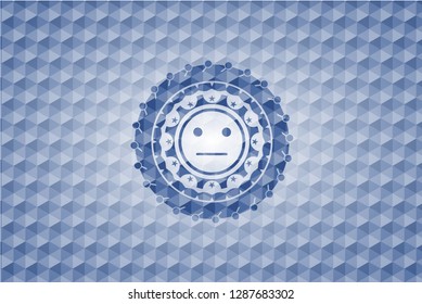 serious face icon inside blue emblem or badge with abstract geometric pattern background.
