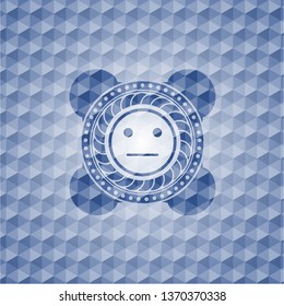 serious face icon inside blue emblem with geometric background.