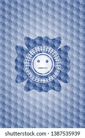 serious face icon inside blue emblem or badge with abstract geometric polygonal pattern background.
