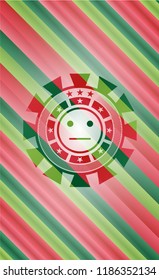 serious face icon inside christmas colors style emblem.