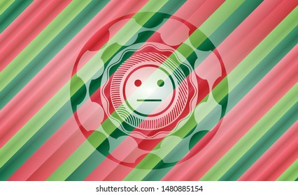 serious face icon inside christmas colors style emblem.