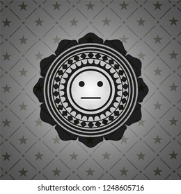 serious face icon inside dark badge