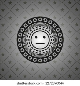 serious face icon inside dark emblem