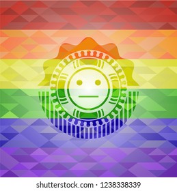 serious face icon inside emblem on mosaic background with the colors of the LGBT flag