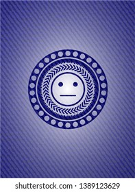 serious face icon inside emblem with denim high quality background