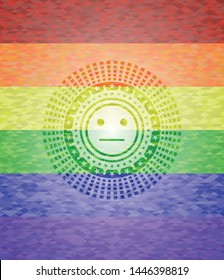 serious face icon inside emblem on mosaic background with the colors of the LGBT flag