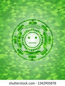 serious face icon inside green emblem with mosaic background