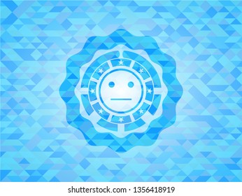 serious face icon inside light blue emblem with triangle mosaic background