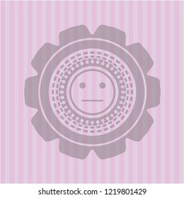 serious face icon inside pink emblem