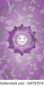 serious face icon inside pink camo emblem
