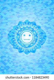serious face icon inside realistic light blue mosaic emblem