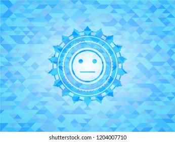 serious face icon inside realistic light blue mosaic emblem