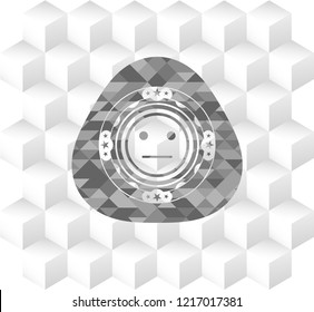 serious face icon inside realistic grey emblem with cube white background
