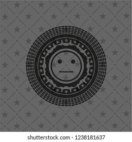 serious face icon inside realistic dark emblem