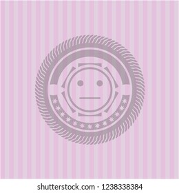 serious face icon inside realistic pink emblem