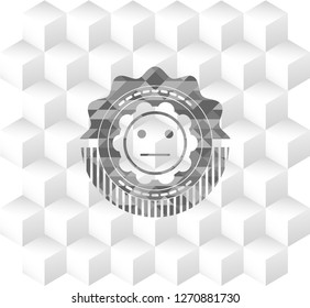 serious face icon inside realistic grey emblem with cube white background