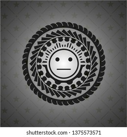 serious face icon inside realistic dark emblem
