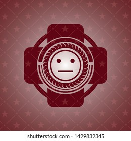 serious face icon inside realistic red emblem
