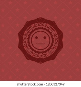 serious face icon inside red emblem. Vintage.