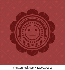 serious face icon inside red emblem. Vintage.