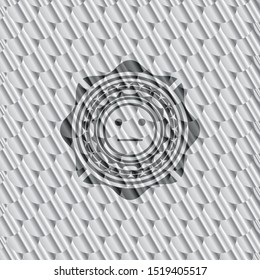 serious face icon inside shiny silver badge. Scales pattern. Vector Illustration. Detailed.