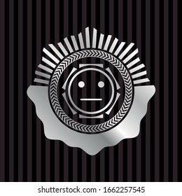 serious face icon inside silver shiny emblem