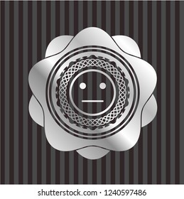 serious face icon inside silvery badge or emblem